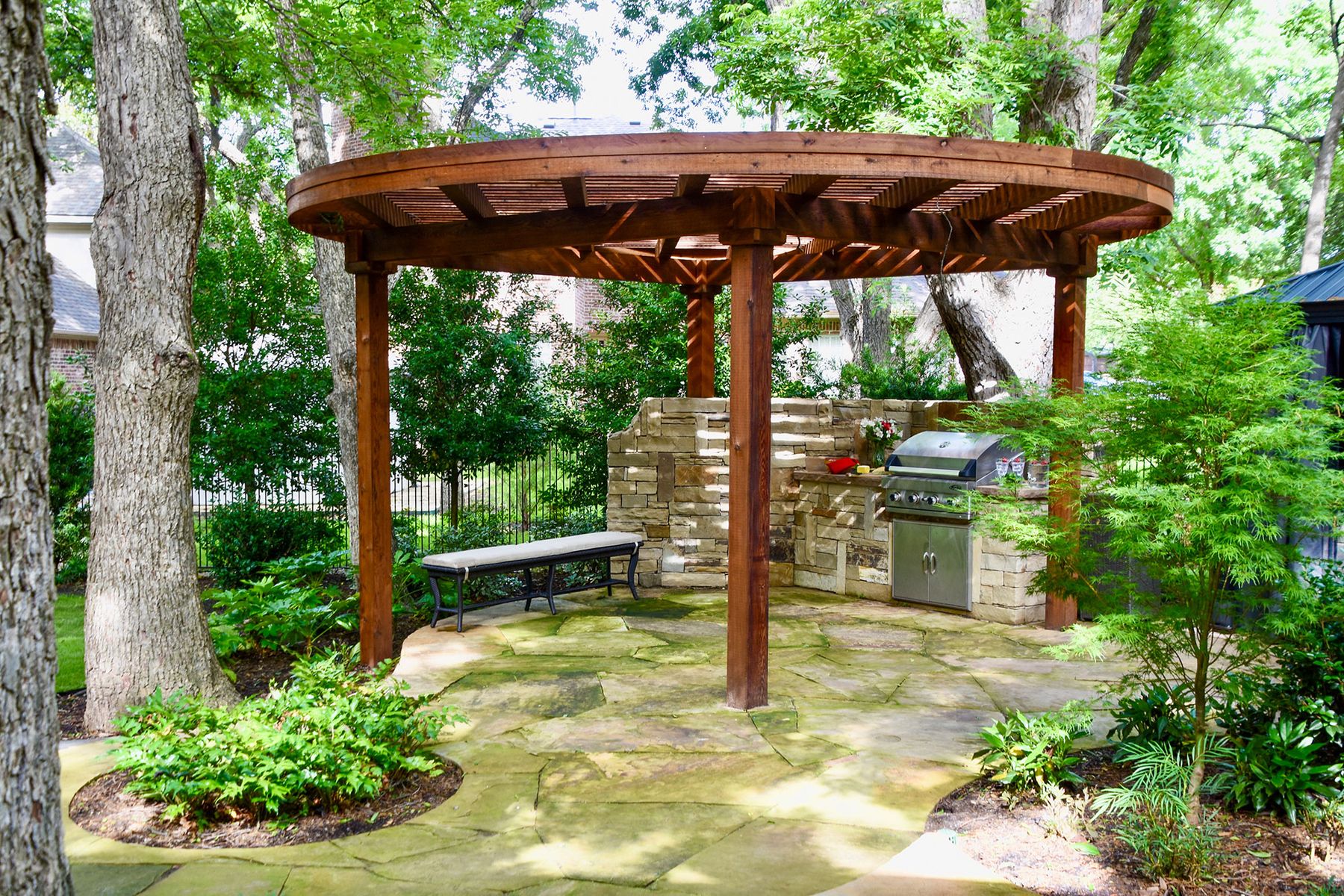 Lundell Residence Pergola Over Grill and Beautiful Stonework